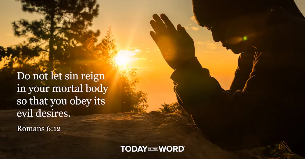 Today's daily devotional Bible verse: Romans 6:12 Do not let sin reign in your mortal body so that you obey its evil desires. | A woman praying at sunset.