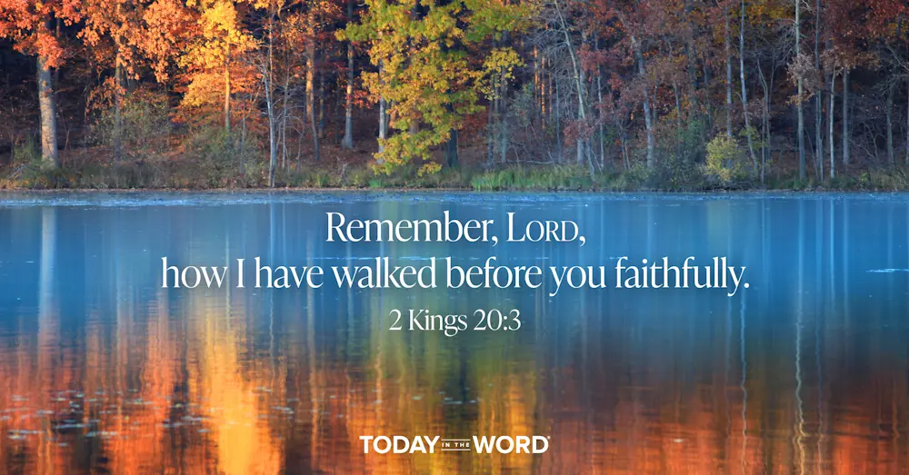 Daily devotional Bible verse: 2 Kings 20:3 Remember, LORD, how I have walked before you faithfully.| Fall leaves surrounding a blue lake.